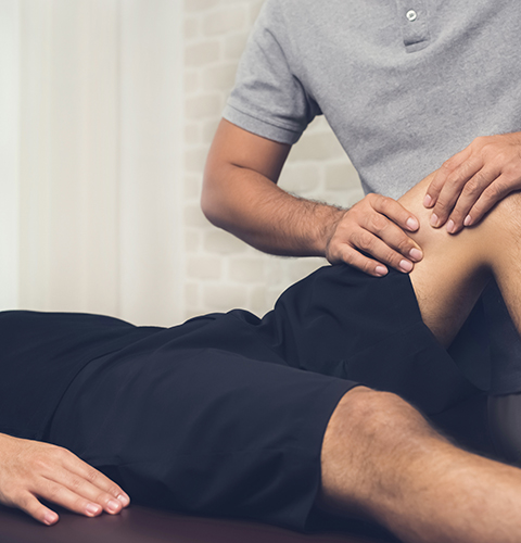 Patient receiving therapy on injured knee